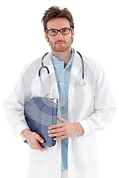 Serious doctor with laptop