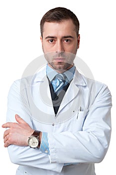 Serious Doctor male with crossed arms and watch on hand isolated