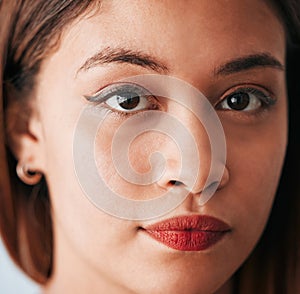 Serious, face and closeup of portrait of woman with youth feeling confident. Vision, young person and female model with