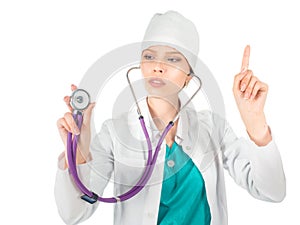 Serious female doctor with stethoscope showing atention sign