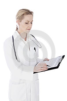 Serious Female Doctor Writing Diagnosis on Paper