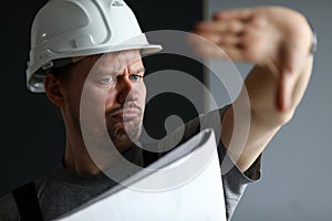 Serious handy foreman at work