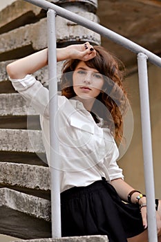 Serious hard-working smart attractive stident, school girl sit near school