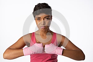 Serious looking woman for breast cancer awareness