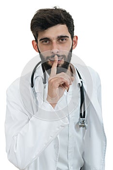 Serious male doctor instruct to keep silence