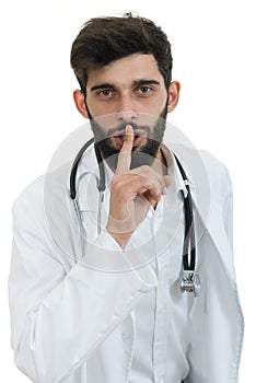 Serious male doctor instruct to keep silence