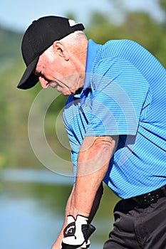 Serious Male Golfer Athletic Man With Golf Club