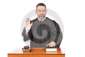 Serious male judge taking oath photo