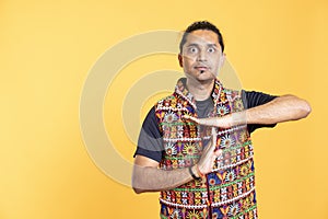Serious man requesting timeout, doing hand gestures photo