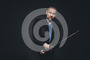 serious man in suit with katana photo