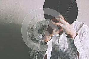 Serious man,Young man sitting thinking about something