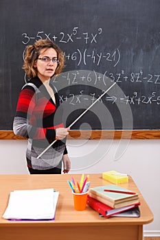 Serious math teacher explaining