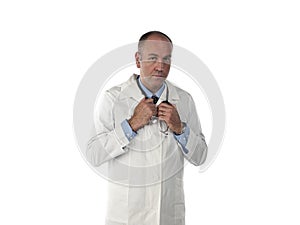 Serious mature doctor holding his stethoscope