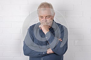 Serious mature man thinking