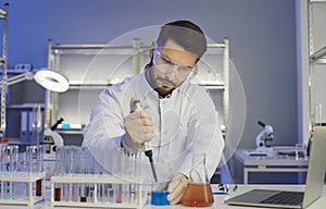 Serious medical scientist working in a pharma or biotech company scientific laboratory