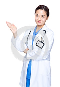 Serious medical woman doctor with hand presentation