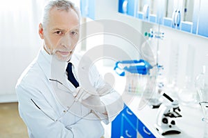 Serious medical worker posing in the laboratory