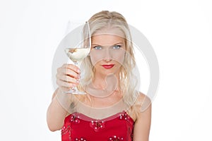 Serious nordic girl having a toast with a glass of wine