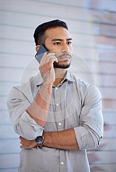 Serious, phone call and Asian man with business, contact and connection with communication, talking and speaking. Male