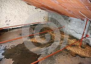 serious problems of moisture and seepage from the roof due to th