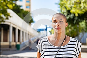 Serious proud woman thinking outdoor