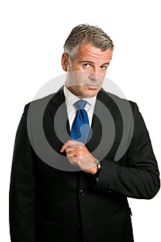 Serious and puzzled mature businessman