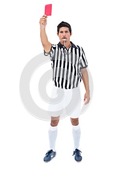 Serious referee showing red card