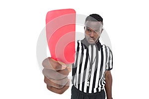 Serious referee showing red card