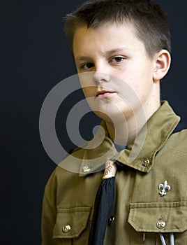 Serious scout boy portrait