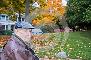 Serious Senior Man Outside with Autumn Background