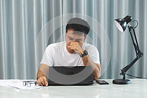 Serious stress business man sitting in office, Problem in working