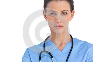 Serious surgeon with stethoscope