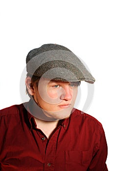 Serious Teen Boy Wearing A Flat Cap