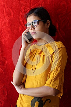 Serious unhappy woman talking on phone