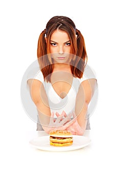 Serious woman with burger