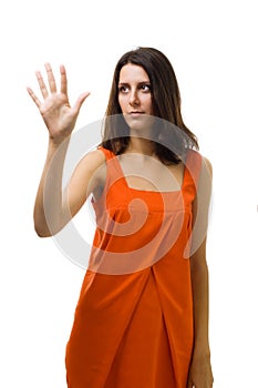 Serious woman pushing abstract interface in air