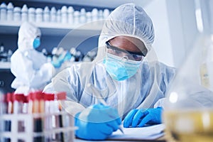 Serious, writing or doctor in lab with notebook for DNA research, medical exam and sample analysis. Healthcare