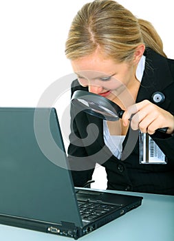 Serious Young Female Looking At Laptop