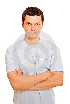Serious young man over white background
