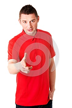 Serious young man pointing you