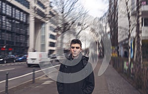 Serious young man in the streets of Berlin