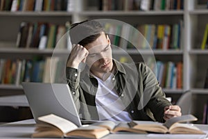 Serious young man university student thinking on difficult problem solution