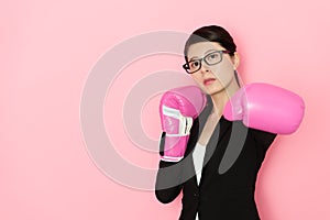 Seriously female office worker face to camera