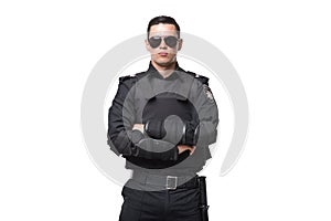 Seriuse cop in sunglasses, uniform with body armor