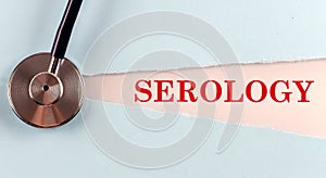 SEROLOGY word made on torn paper, medical concept background