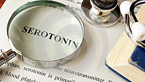 Serotonin written on a page. photo