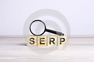 SERP word made with wooden blocks. can be used for business, marketing and education concept