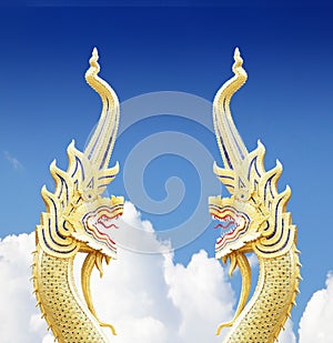 Serpent king of nagas statue on blue sky