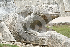 Serpent sculpture, the details of El Castillo in Chichen Itza in Mexico