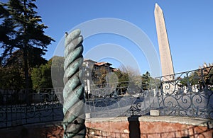 Serpentine Column behind Obelisk